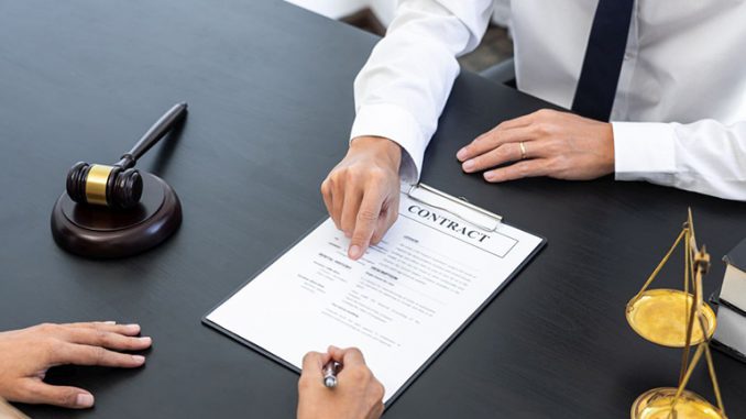 Lawyer or judge present client with contract document papers, La
